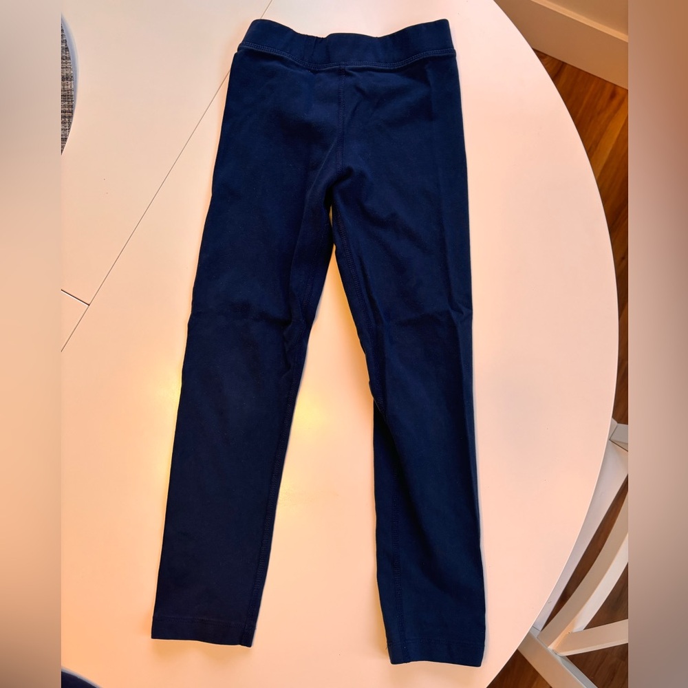 Size 7 blue leggings, excellent used condition.